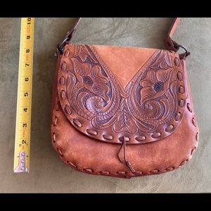 Vintage leather embossed saddle bag